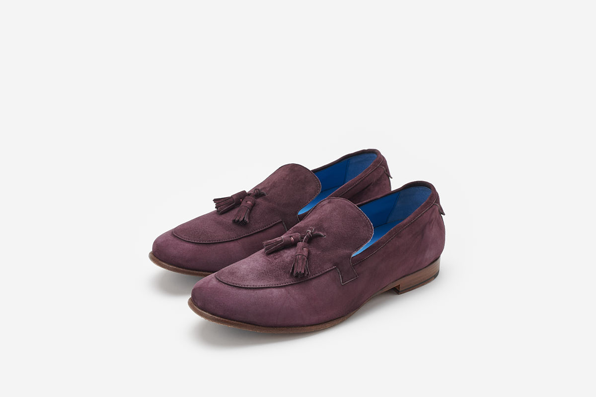 Mocassino scamosciato con nappine